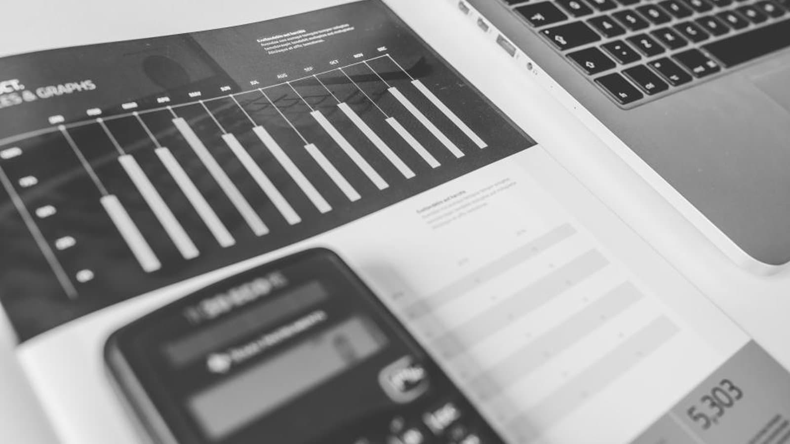 Calculator and charts on a desk